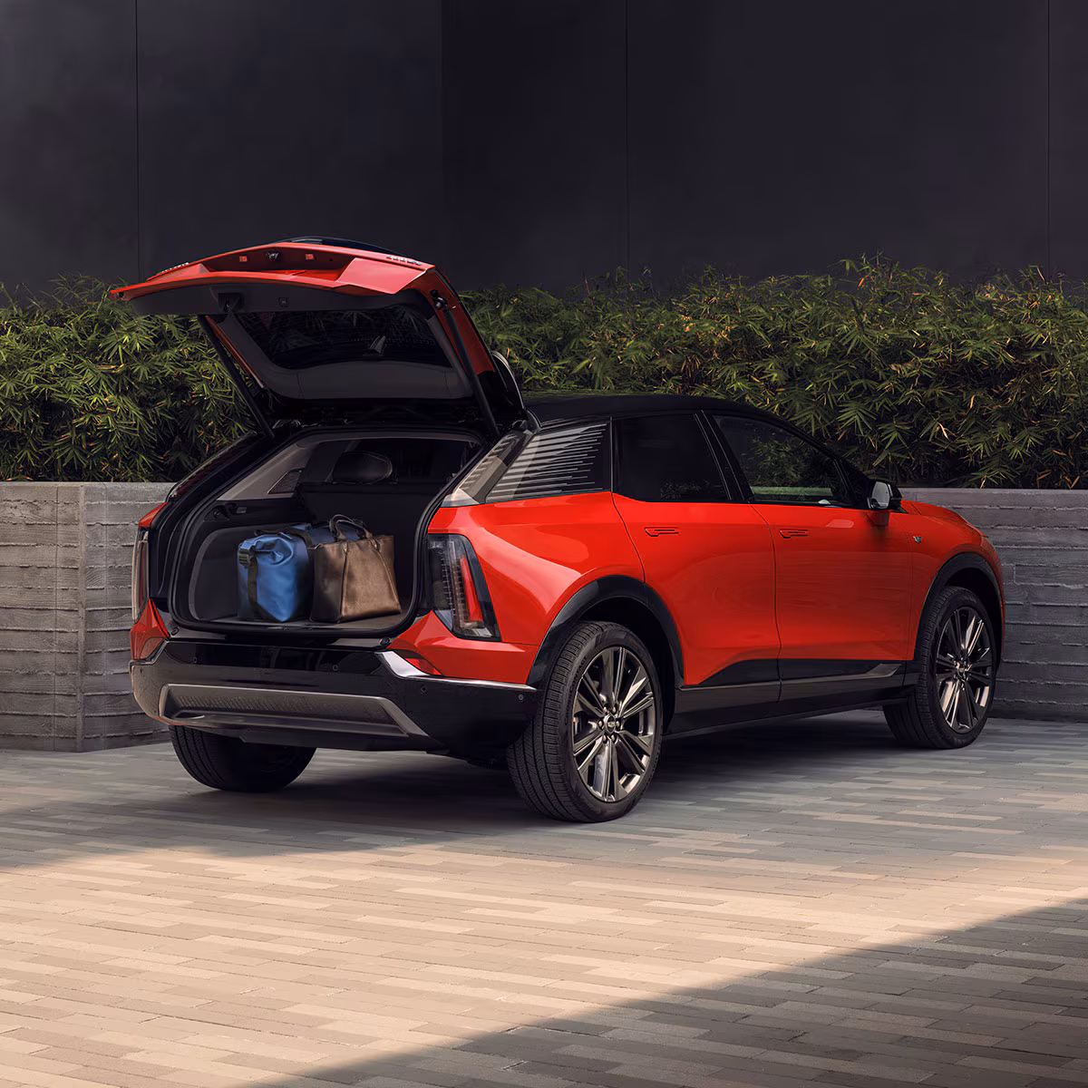 2027 Cadillac OPTIQ cargo area with liftgate open